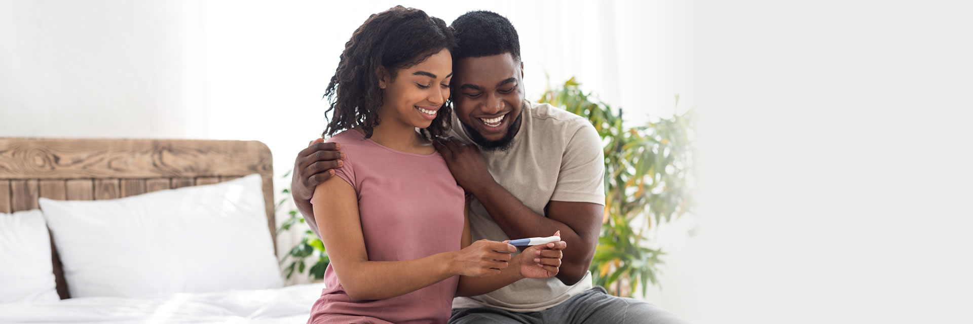 Couple Looking at Pregnancy Test