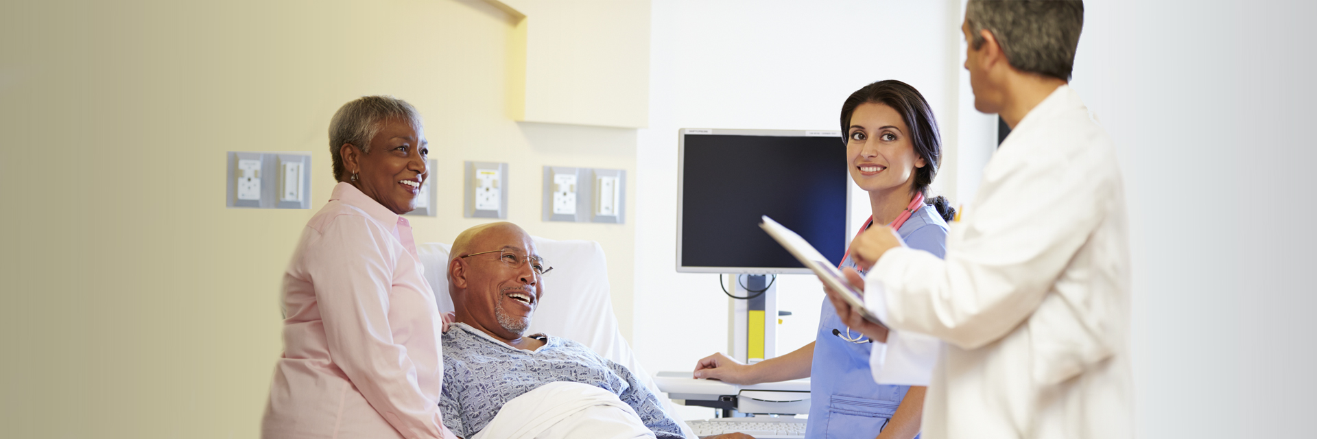 Couple with medical staff