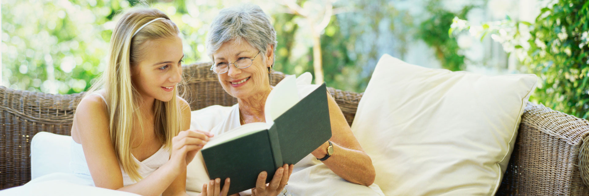 Grandmother and Granddaughter Reading