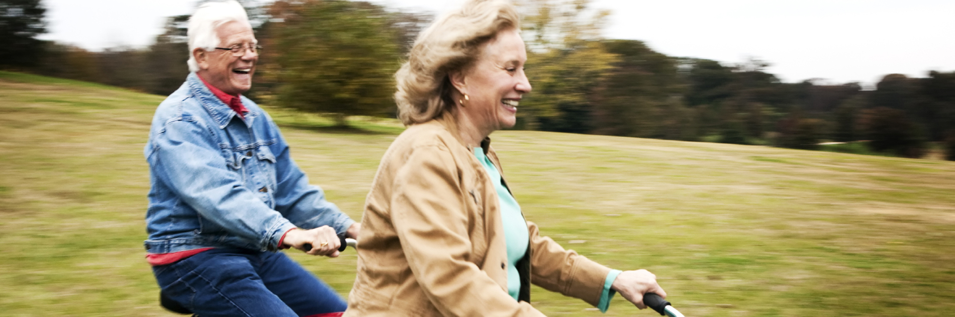 Older couple riding bikes