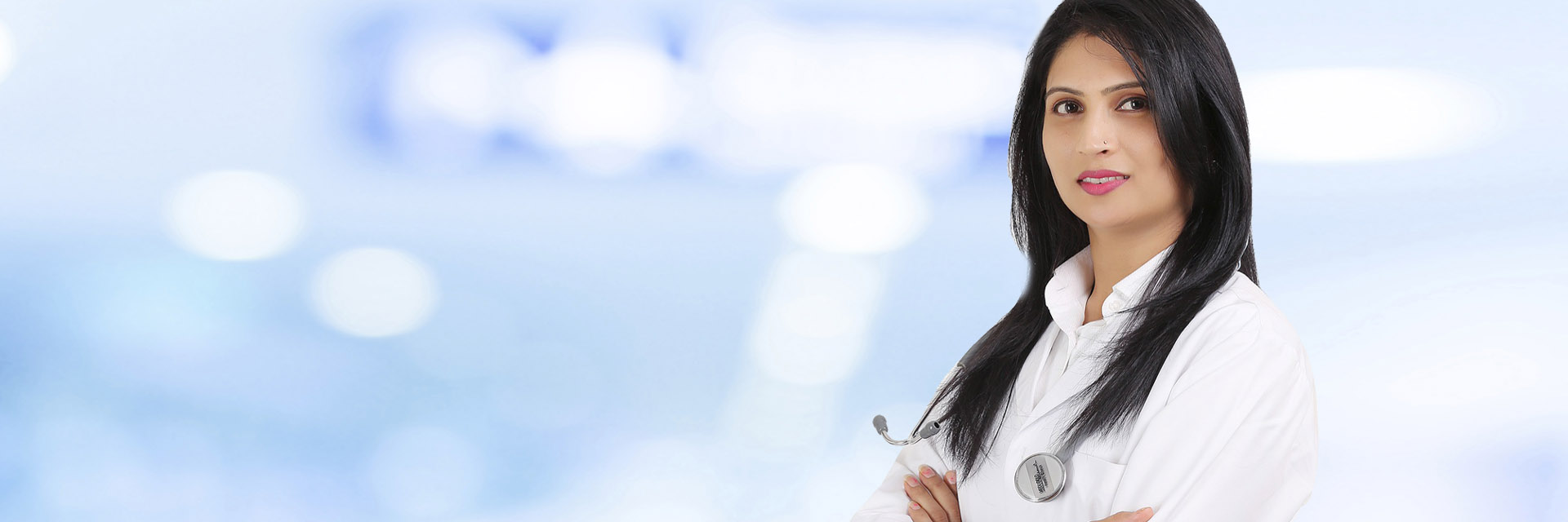 Female Doctor Smiling with Arms Folded