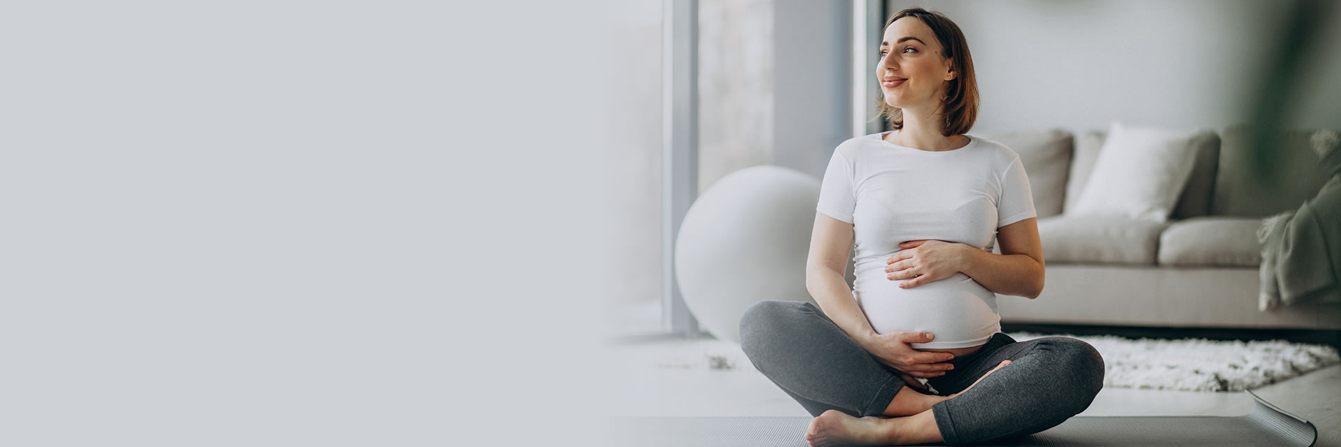 Pregnant woman holding stomach