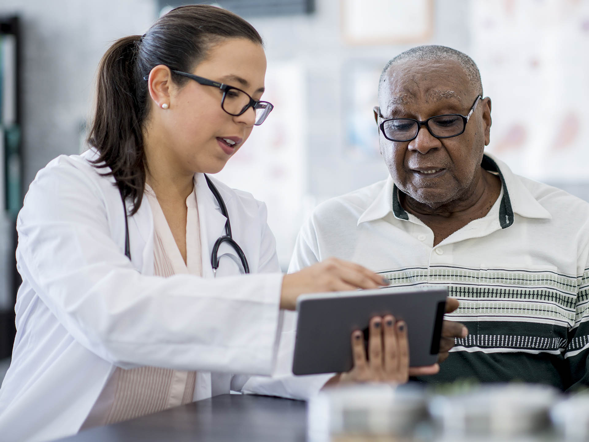 Provider and patient on tablet