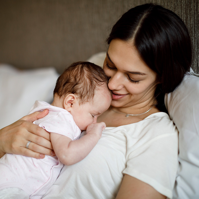 Mom holding baby