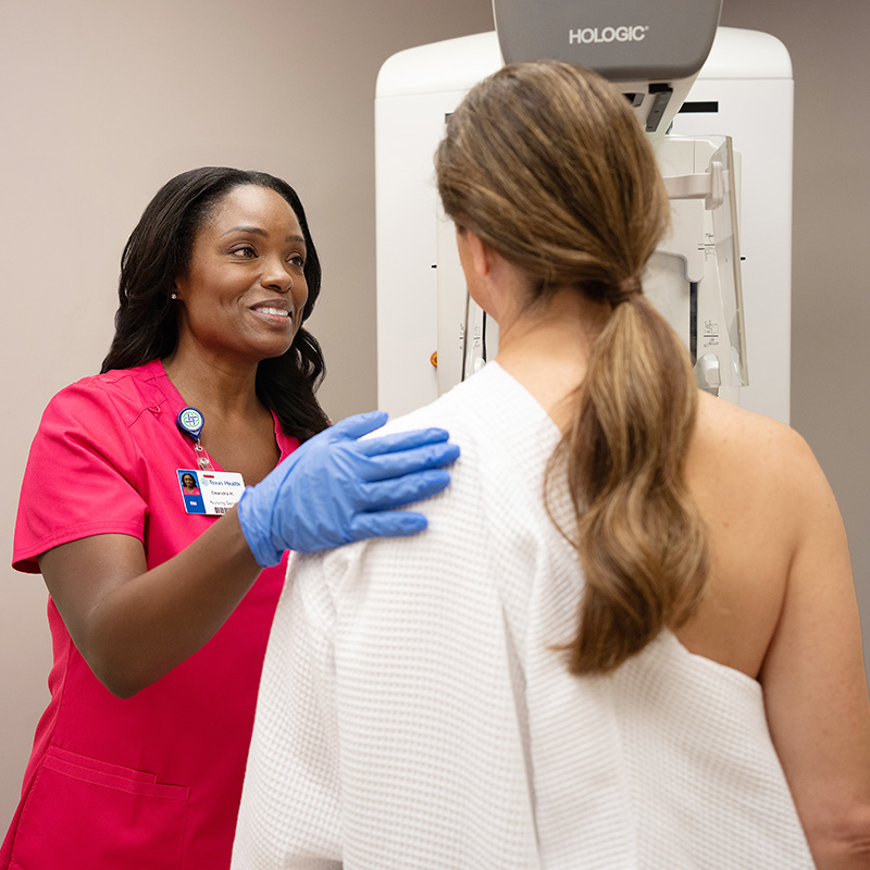Woman getting mammogram