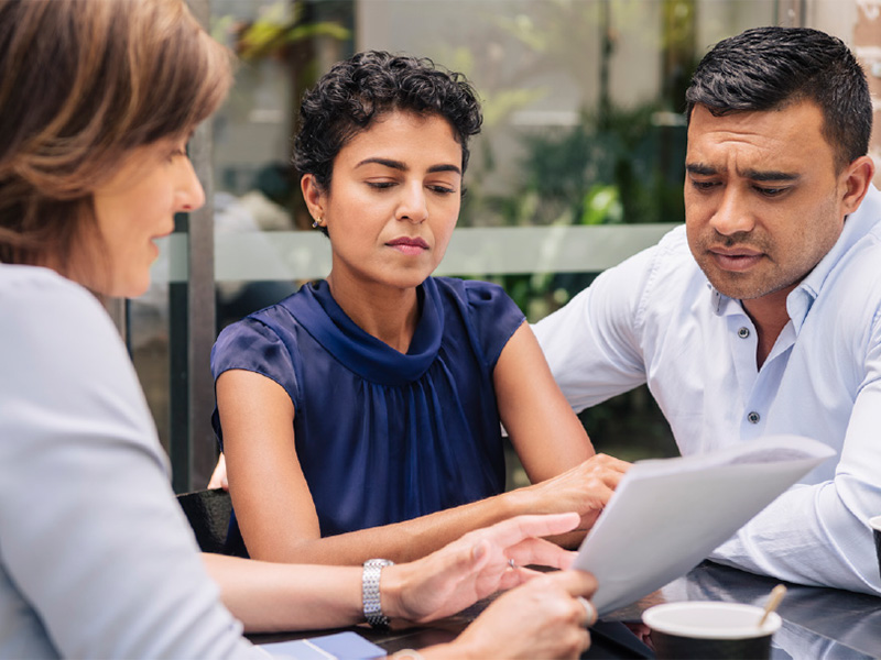 Couple looking at document