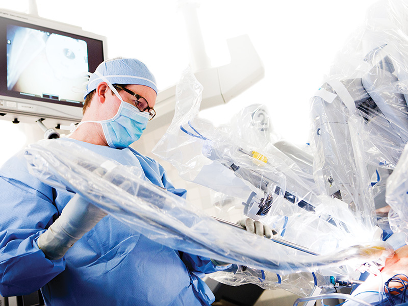 Doctor performing robotic surgery