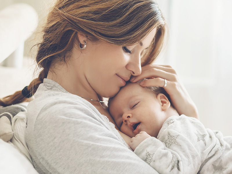 Mom holding baby