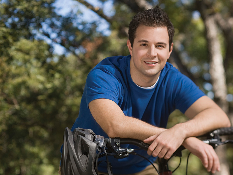 Man sitting on bike