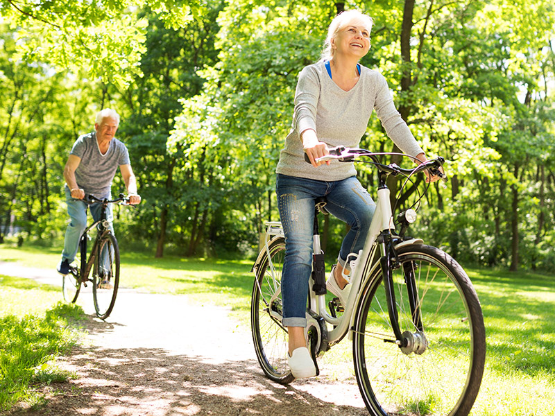 Mature Couple on Riding Bikes
