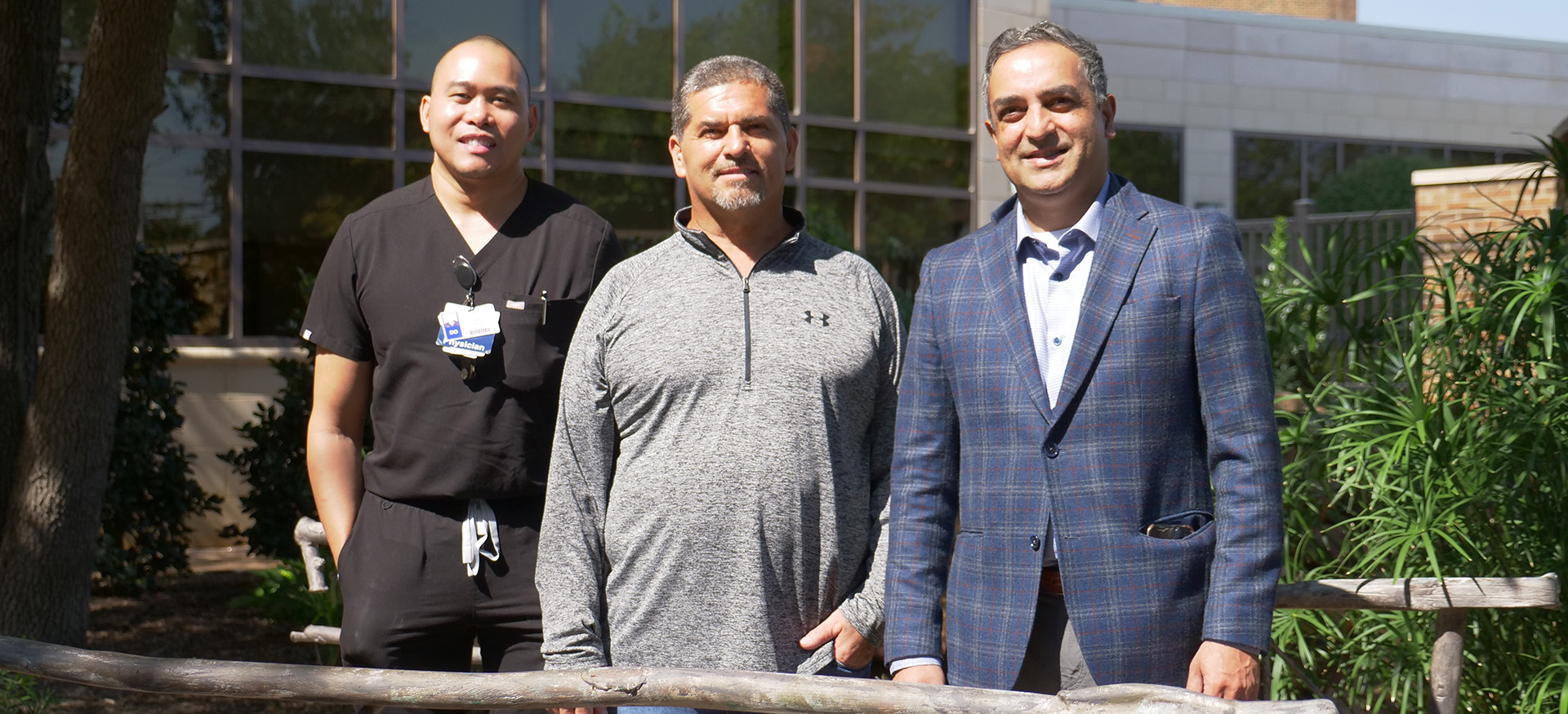 Carlos Romero with doctors