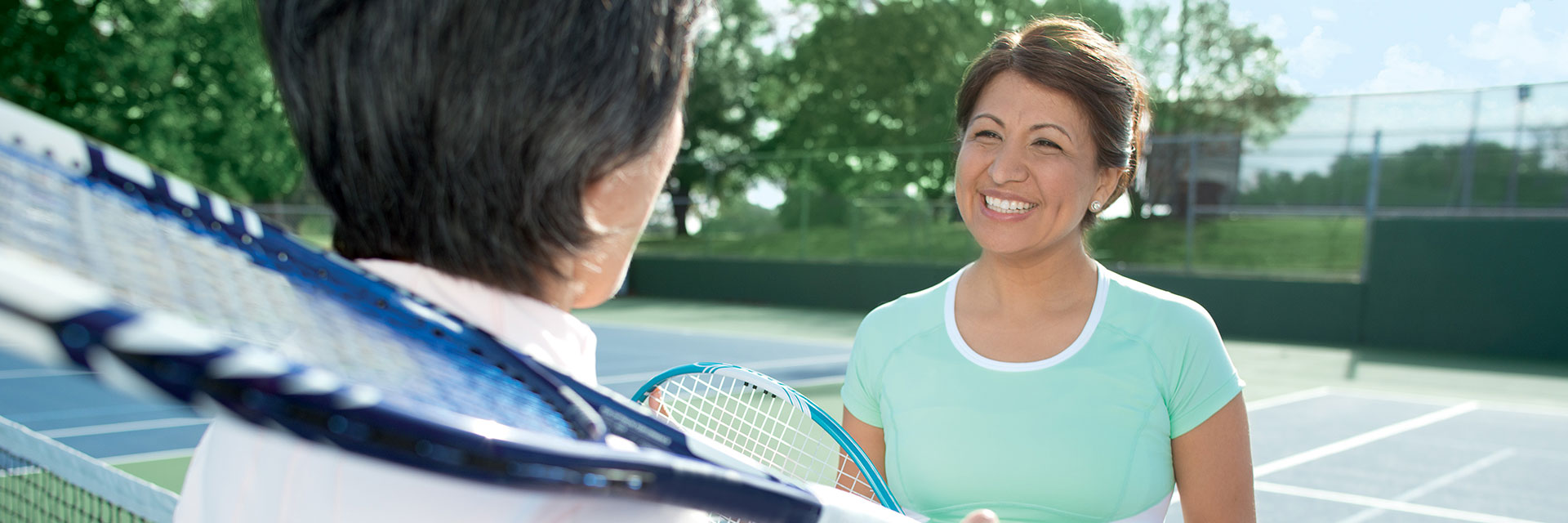 Women playing tennis